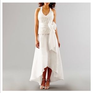 Brand new with tags, gorgeous white dress. Size 4.